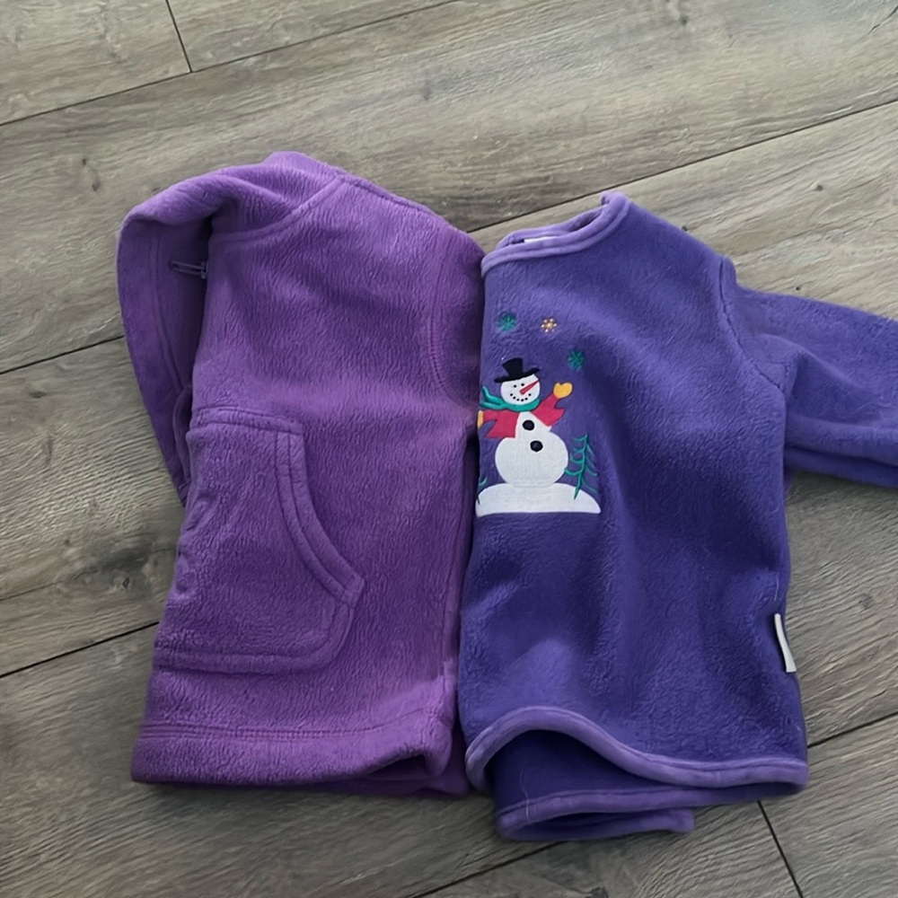 Lot of 2 purple fleece pullovers. Size 12 months